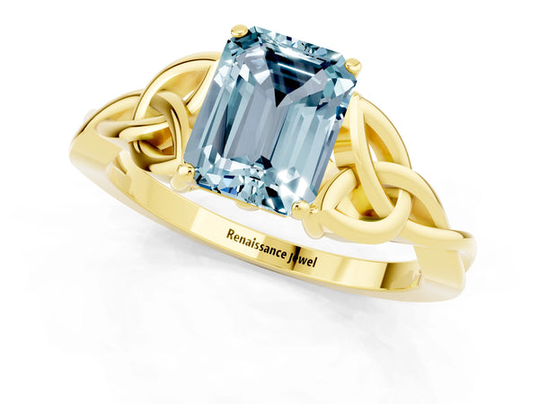Yellow gold Emerald Cut Aquamarine Solitaire Engagement Ring with Celtic Knot Band and Four-Prong Setting