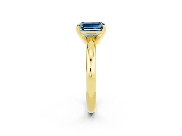 Yellow gold Emerald Cut Aquamarine Solitaire Engagement Ring with Round Band and Four-Prong Setting