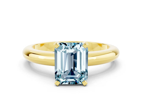 Yellow gold Emerald Cut Aquamarine Solitaire Engagement Ring with Round Band and Four-Prong Setting