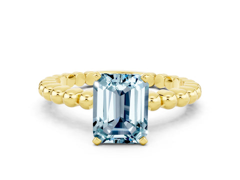 Yellow gold Emerald Cut Aquamarine Solitaire Ring with Beaded Band and Prong Setting