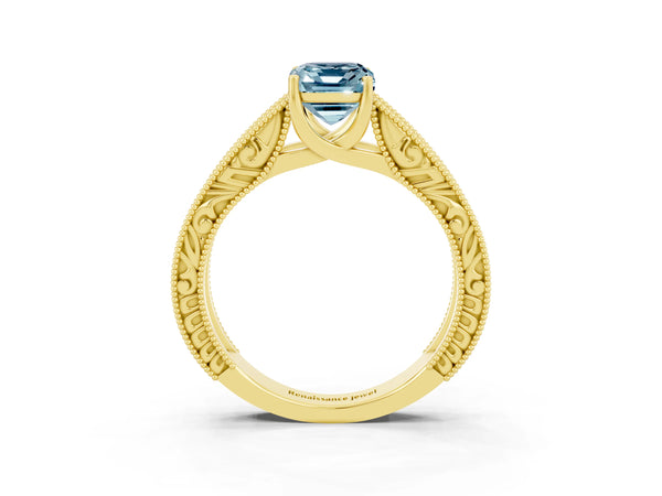 Yellow gold Emerald Cut Aquamarine Solitaire Ring with Engraved Band and Four-Prong Setting