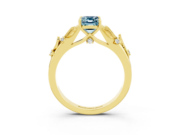 Yellow gold Emerald Cut Aquamarine Solitaire Ring with Leaf Motif Band and Four-Prong Setting
