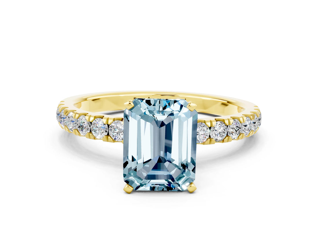 Yellow gold Emerald Cut Aquamarine Solitaire Ring with Pavé Accents and Four-Prong Setting