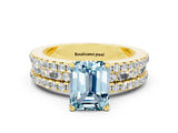 Yellow gold Emerald Cut Aquamarine Solitaire Ring with Pavé and Channel Set Band