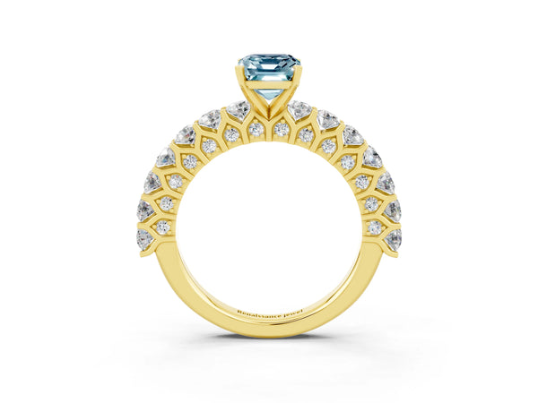 Yellow gold Emerald Cut Aquamarine Solitaire Ring with Shared Prong Pavé Band and Four-Prong Setting