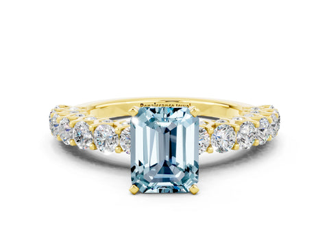 Yellow gold Emerald Cut Aquamarine Solitaire Ring with Shared Prong Pavé Band and Four-Prong Setting