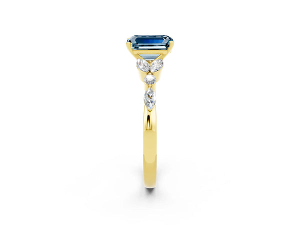 Yellow gold Emerald Cut Aquamarine Solitaire Ring with Side Stones and Four-Prong Setting