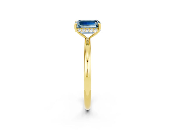 Yellow gold Emerald Cut Aquamarine Solitaire Ring with Thin Band and Four-Prong Setting