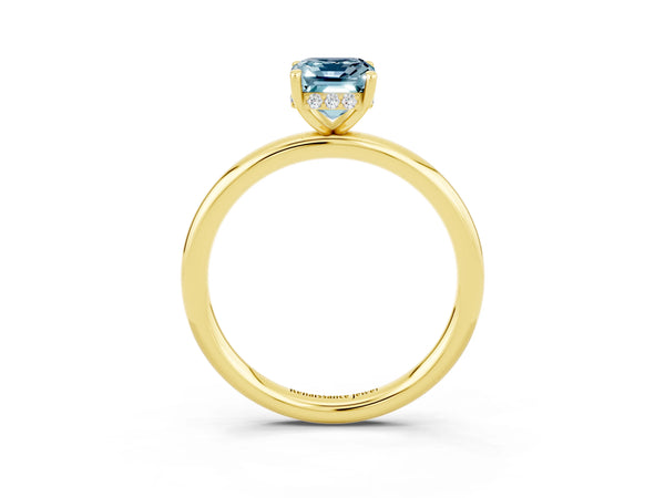 Yellow gold Emerald Cut Aquamarine Solitaire Ring with Thin Band and Four-Prong Setting
