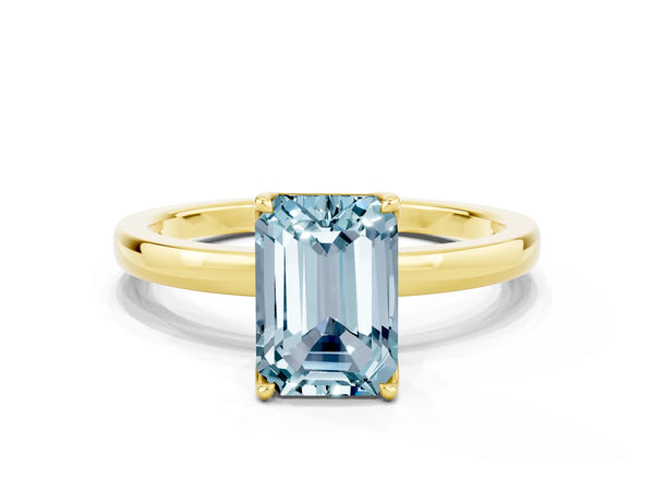 Yellow gold Emerald Cut Aquamarine Solitaire Ring with Thin Band and Prong Setting