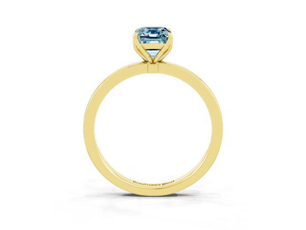 Yellow gold Emerald Cut Aquamarine Solitaire Ring with Thin Band and Prong Setting