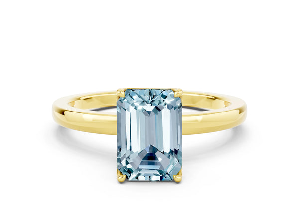 Yellow Gold Emerald Cut Aquamarine Solitaire Engagement Ring with Thin Plain Band and Open Basket