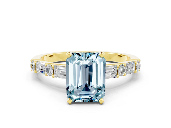 Yellow gold Emerald Cut Aquamarine Solitaire with Side Baguettes and Channel Set Band