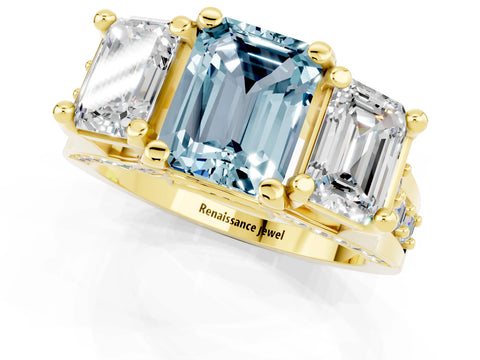 Yellow gold Emerald Cut Aquamarine Three-Stone Ring with Channel Set Band and Four-Prong Setting_1