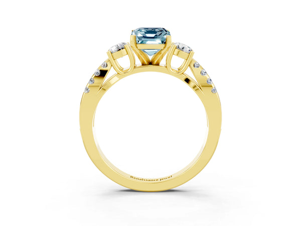 Yellow gold Emerald Cut Aquamarine Three-Stone Ring with Pavé Split Shank and Four-Prong Setting