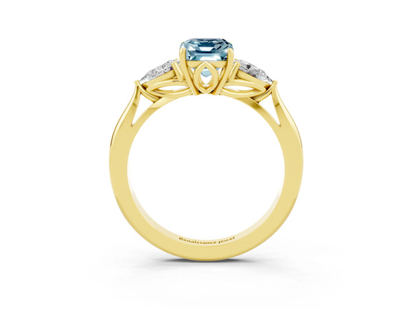 Yellow gold Emerald Cut Aquamarine Three-Stone Ring with Pear  Side Stones and Prong Setting