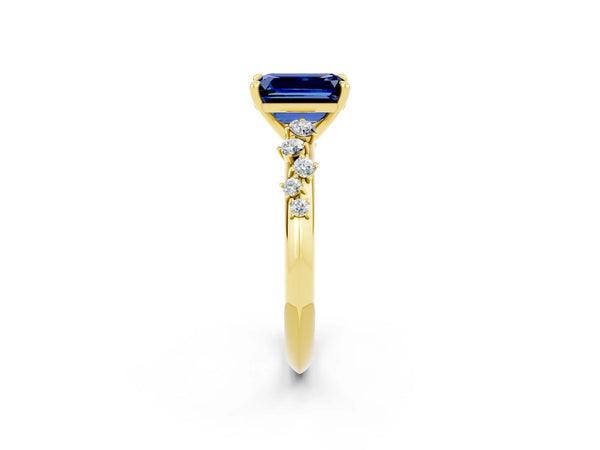 Yellow gold Emerald Cut Blue Sapphire Cluster Side Stone Solitaire Ring with Prong Setting