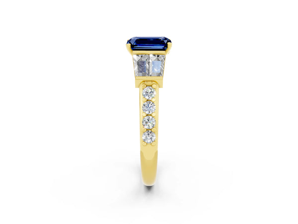 Yellow gold Emerald Cut Blue Sapphire Engagement Ring with Baguette Side Stones and Channel Set Band