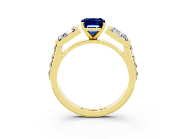 Yellow gold Emerald Cut Blue Sapphire Engagement Ring with Baguette Side Stones and Channel Set Band