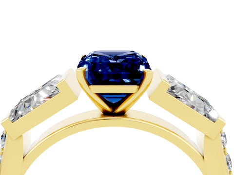 Yellow gold Emerald Cut Blue Sapphire Engagement Ring with Baguette Side Stones and Channel Set Band_4