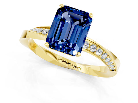 Yellow gold Emerald Cut Blue Sapphire Engagement Ring with Side Stone Accents and Four-Prong Setting_28