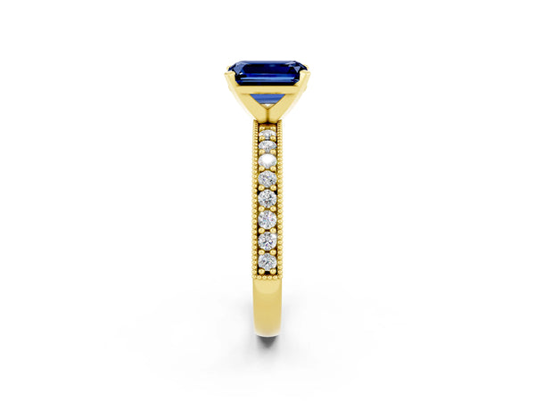 Yellow gold Emerald Cut Blue Sapphire Milgrain Pavé Engagement Ring with Four-Prong Setting