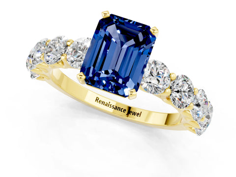 Yellow gold Emerald Cut Blue Sapphire Prong Setting with Side Stones on a Pave Band_1