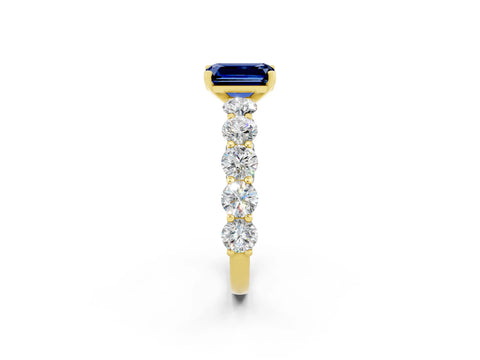 Yellow gold Emerald Cut Blue Sapphire Prong Setting with Side Stones on a Pave Band_2