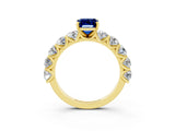 Yellow gold Emerald Cut Blue Sapphire Prong Setting with Side Stones on a Pave Band_3