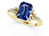 Yellow gold Emerald Cut Blue Sapphire Ring with Side Stones and Four-Prong Setting_37