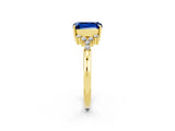 Yellow gold Emerald Cut Blue Sapphire Ring with Side Stones and Four-Prong Setting_38