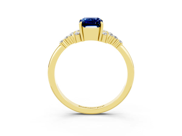 Yellow gold Emerald Cut Blue Sapphire Ring with Side Stones and Four-Prong Setting
