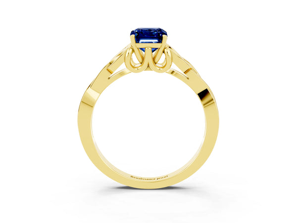 Yellow gold Emerald Cut Blue Sapphire Solitaire Celtic Knot Ring with Four-Prong Setting