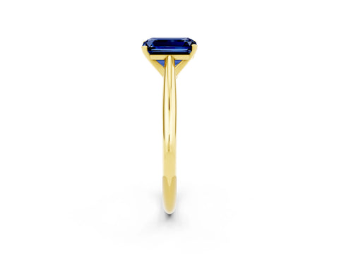 Yellow gold Emerald Cut Blue Sapphire Solitaire Engagement Ring with Cathedral Setting and Four-Prong Mount_14