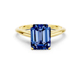 Yellow gold Emerald Cut Blue Sapphire Solitaire Engagement Ring with Cathedral Setting and Four-Prong Mount_30