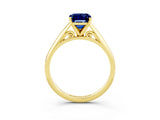 Yellow gold Emerald Cut Blue Sapphire Solitaire Engagement Ring with Cathedral Setting and Four-Prong Mount_33