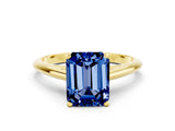 Yellow gold Emerald Cut Blue Sapphire Solitaire Engagement Ring with Cathedral Setting and Four-Prong Mount_66