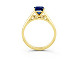 Yellow gold Emerald Cut Blue Sapphire Solitaire Engagement Ring with Cathedral Setting and Four-Prong Mount_69