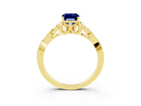 Yellow gold Emerald Cut Blue Sapphire Solitaire Engagement Ring with Celtic Knot Band and Four-Prong Setting_3
