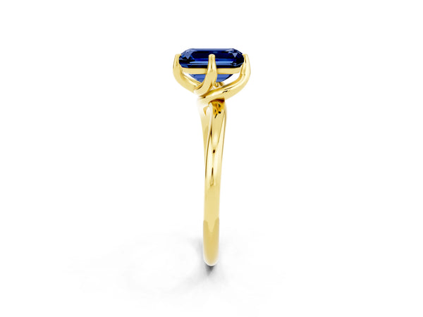 Yellow gold Emerald Cut Blue Sapphire Solitaire Engagement Ring with Four-Prong Setting and Classic Band