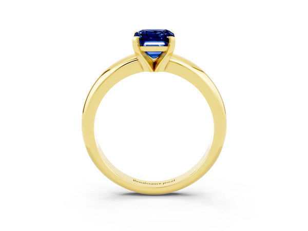 Yellow gold Emerald Cut Blue Sapphire Solitaire Engagement Ring with Round Band and Four-Prong Setting