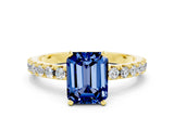 Yellow gold Emerald Cut Blue Sapphire Solitaire Pavé Band with Four-Prong Setting