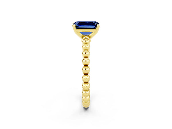 Yellow gold Emerald Cut Blue Sapphire Solitaire Ring with Beaded Band and Prong Setting