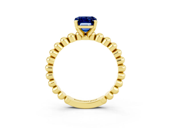 Yellow gold Emerald Cut Blue Sapphire Solitaire Ring with Beaded Band and Prong Setting