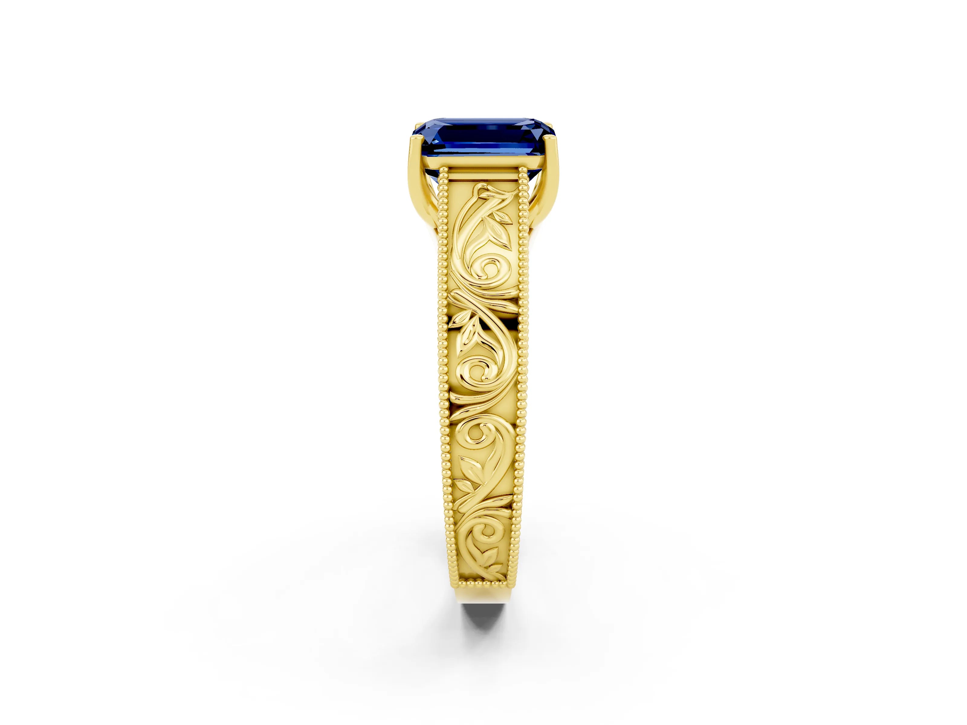 Yellow gold Emerald Cut Blue Sapphire Solitaire Ring with Engraved Band and Four-Prong Setting_2