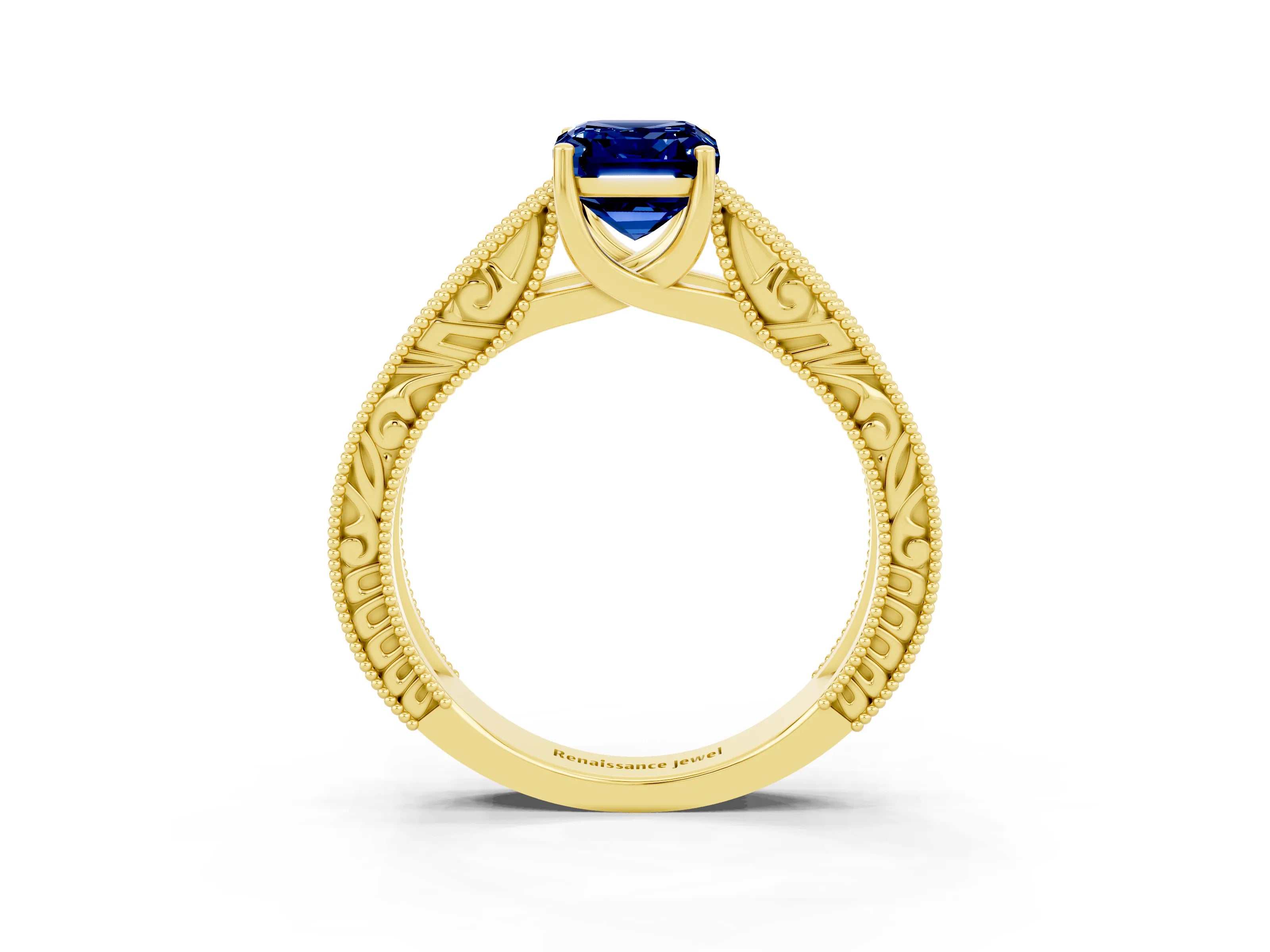 Yellow gold Emerald Cut Blue Sapphire Solitaire Ring with Engraved Band and Four-Prong Setting_3