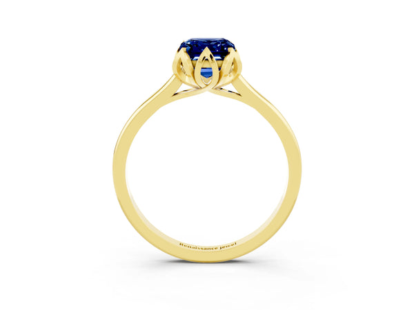 Yellow gold Emerald Cut Blue Sapphire Solitaire Ring with Flower Prong Setting and Classic Band