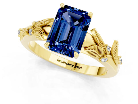 Yellow gold Emerald Cut Blue Sapphire Solitaire Ring with Leaf Motif Band and Four-Prong Setting_1