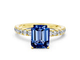 Yellow gold Emerald Cut Blue Sapphire Solitaire Ring with Pavé Accents and Four-Prong Setting