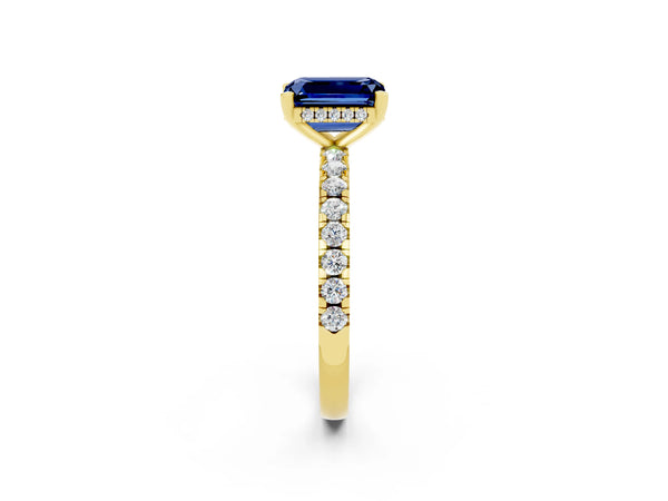 Yellow gold Emerald Cut Blue Sapphire Solitaire Ring with Round  Pavé Band and Four-Prong Setting